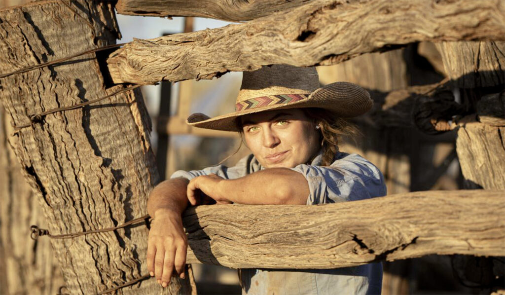 Jillaroo Rosie takes a break from drafting in the cattle yards. Picture: Stacey Ford Photography